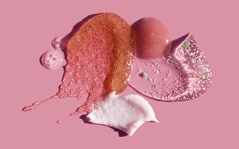 Textures of gentle exfoliating scalp scrubs and soothing creams.